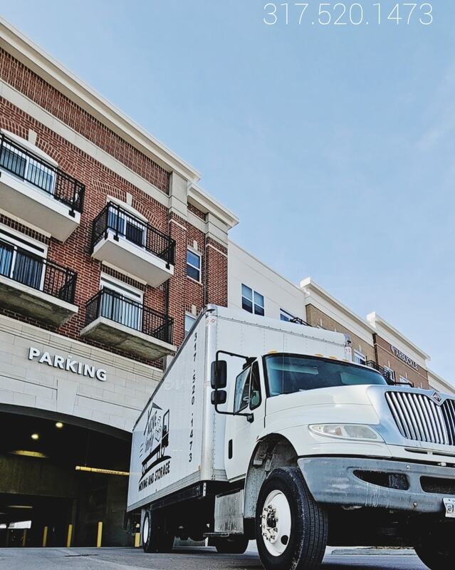 Indianapolis moving company, Move Indy, pulls truck up to apartment complex to being loading.