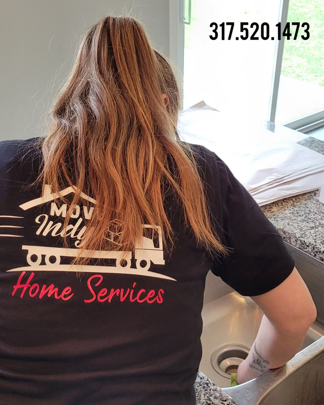 Move Indy providing professional home cleaning to a customer's kitchen.