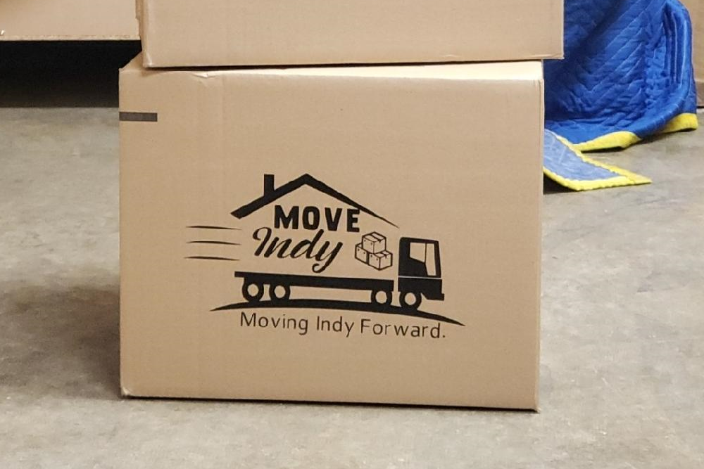 Indianapolis moving company, Move Indy, displays their logo'd packing supplies.